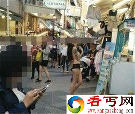 台湾街头现裸体美女 不惧路人目光大胆裸露引争议